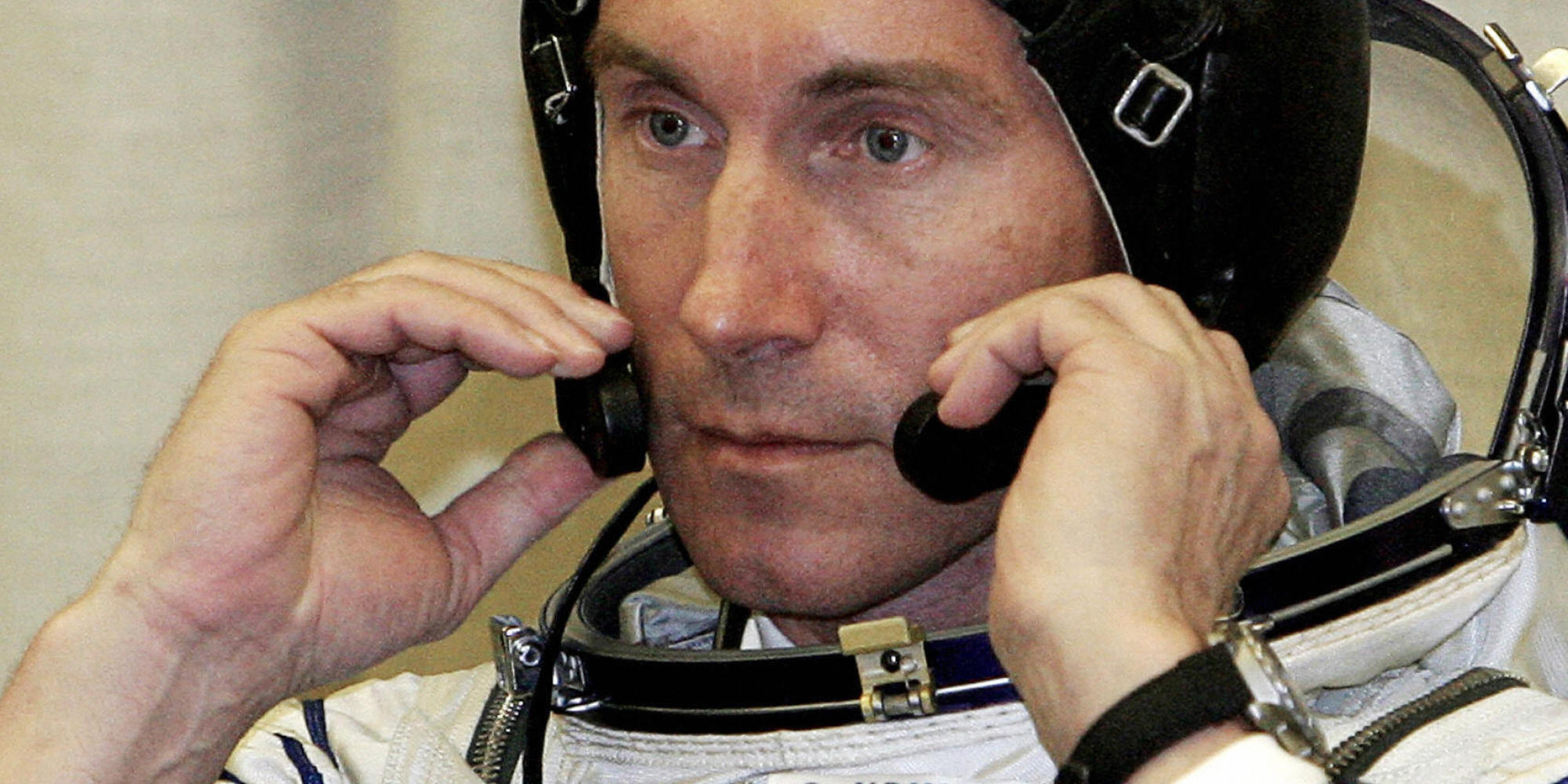 Baikonur, KAZAKHSTAN: (FILES) Picture taken 14 April 2005, shows Russian cosmonaut Sergey Krikalev as he checks his headset at the Baikonur cosmodrome prior launch of Soyuz-TMA-6 booster rocket. Veteran Russian cosmonaut Sergei Krikalev broke the record 16 August 2005 for the longest total time in space -- and still has two months left before returning to Earth. Krikalev, who has been aboard the International Space Station (ISS) since April 15, passed the record previously held by fellow-Russian Sergei Avdeyev, who spent a career total of 747 days, 14 hours, 14 minutes and 11 seconds in space, a spokeswoman for Russian ground control told AFP. AFP PHOTO / MAXIM MARMUR (Photo credit should read MAXIM MARMUR/AFP/Getty Images)